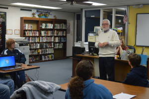 VISITING AUTHOR. Novelist Larry Baker speaks to students in two of Sharon Bullard's English classes.